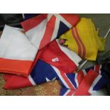 A quantity of assorted cloth flags.