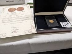 A cased Queen Victoria young head 1884 half sovereign with certificate.
