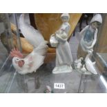 Two Lladro figures and a Lladro cockerel.