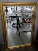 A gilt framed bevel edged mirror, COLLECT ONLY.