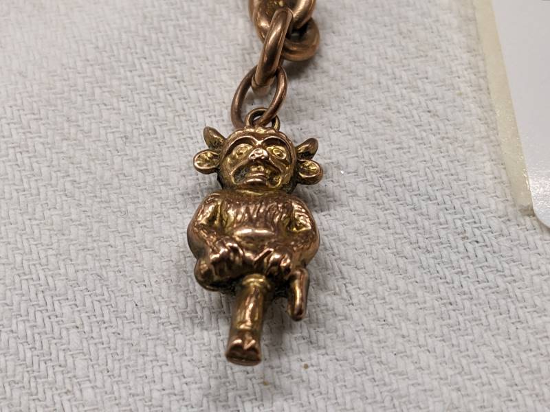 A 9ct gold Lincoln Imp charm on a 9ct gold 'T' bar. 6.4 grams. - Image 2 of 3