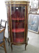 A 19th century French demi lune vitrine, 150 cm tall.COLLECT ONLY.