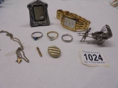 A mixed lot including hm silver photo frame, rickshaw, gold pendant, gent's Rotary wrist watch etc.,