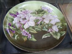 A large hand painted floral platter.