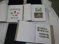 Three albums of mainly Jersey stamps.