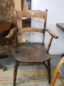 An early 20th century kitchen arm chair. COLLECT ONLY.