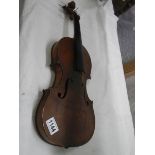 An old violin marked Copiede,, Gaspar Da Salo in Brescia.