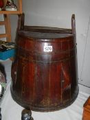 An oak lidded barrel.