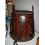 An oak lidded barrel.