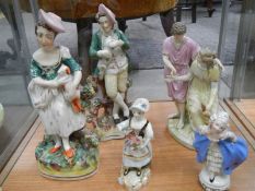 A mixed lot of Victorian porcelain figures.