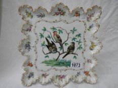 An early Dresden hand painted plated depicting birds.