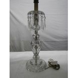 A Victorian cut glass table lamp.