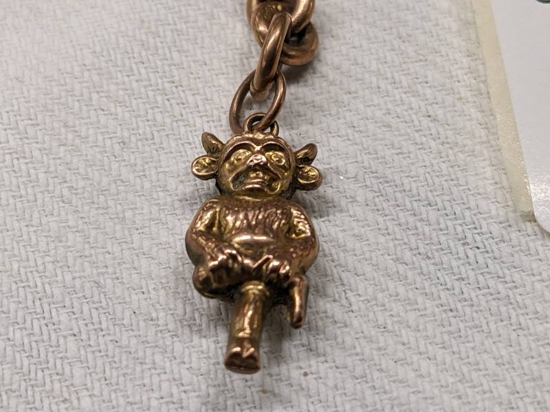 A 9ct gold Lincoln Imp charm on a 9ct gold 'T' bar. 6.4 grams. - Image 3 of 3