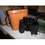 A pair of 12 x 50 field binoculars.