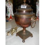 A Victorian copper samovar.