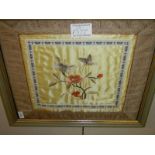 A framed and glazed embroidery on silk with embroidered mount.