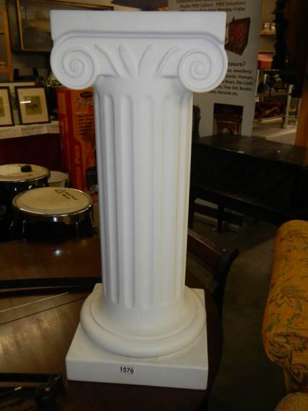 A Grecian style pedestal (plastic). COLLECT ONLY.