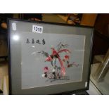 A framed and glazed Chinese embroidery featuring birds.