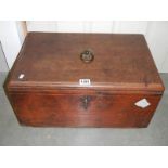 A Victorian mahogany box with inner compartments.