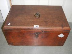 A Victorian mahogany box with inner compartments.