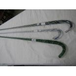 Three 19th century Nailsea glass walking sticks, COLLECT ONLY.
