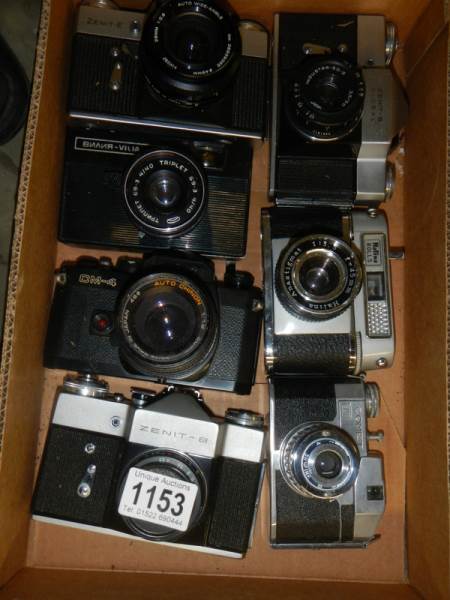 Seven SLR type 60/70's camera's.