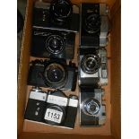 Seven SLR type 60/70's camera's.