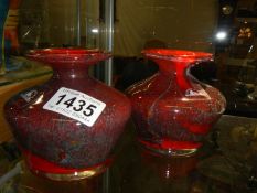 A pair of Maltese Pheonician glass vases.