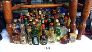 A large quantity of miniatures some with contents