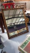 A gilt framed mirror 40cm x 47cm