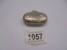 A silver double sovereign case, 34 grams.
