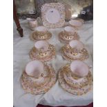 A 21 piece tuscan china tea set.