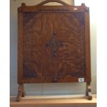 A 1930's oak fire screen, 71cm x 51cm COLLECT ONLY