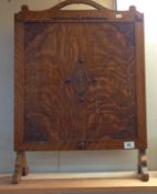 A 1930's oak fire screen, 71cm x 51cm COLLECT ONLY