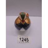 A Royal Crown Derby pheasant paperweight with silver stopper.