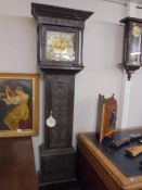 An early carved oak Grandfather clock, 8 day with brass dial, COLLECT ONLY.