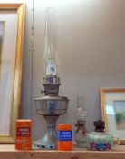 A Victorian glass finger oil lamp & 1 other 7 an Aladdin paraffin lamp. COLLECT ONLY