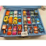 A Matchbox carry case with 48 cars including Corgi Juniors, most in very good condition.