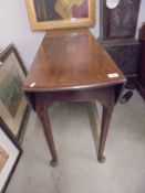 A mahogany pad foot drop leaf table, COLLECT ONLY.