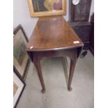 A mahogany pad foot drop leaf table, COLLECT ONLY.