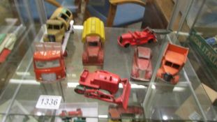 A quantity of mixed die cast including Dinky, Large Moho bulldozer, Crescent etc.,
