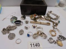 A quantity of jewellery in a lead lined antique oak box, silver items, rings, earrings, a gold ring