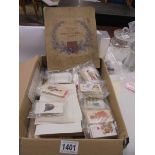 A good lot of cigarette and tea cards including military uniforms.