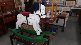 A vintage painted wooden rocking horse. rocker L122cm, W35cm, H94cm, COLLECT ONLY