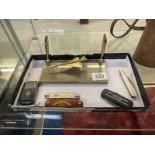 A gilded model of Concorde as a pen stand including quantity vintage penknives including golden