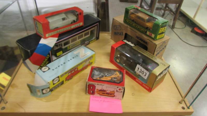 A mixed lot of boxed die cast including Solido, Siku and Russian.