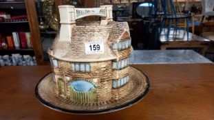 A lovely London pottery 'Bell Inn' stilton cheese dome