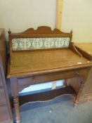 An early 20th century washstand with tiled back, COLLECT ONLY.