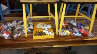 Celebrating peanuts 60 years hardback book & a set of 12 large McDonalds Snoopy figures