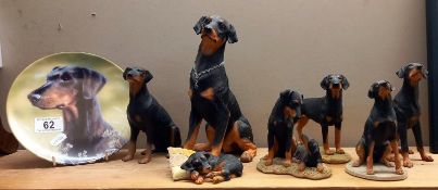A quantity of Doberman figures, 1 by Country Artists, 3 by Sherratt & Simpson, 1 unnamed, 2 by